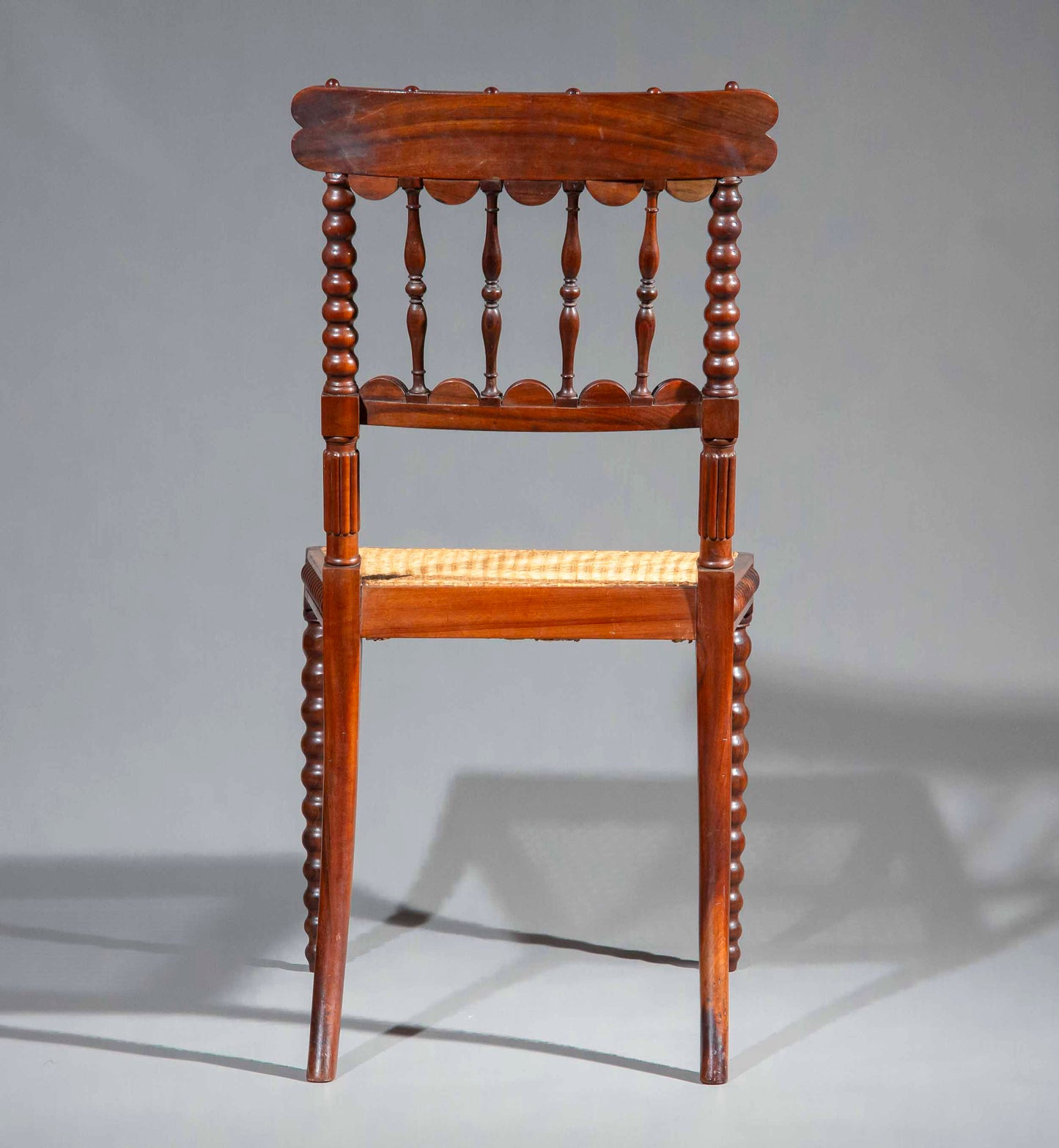Pair of Regency Gonçalo Alves Chairs with Caned Seats