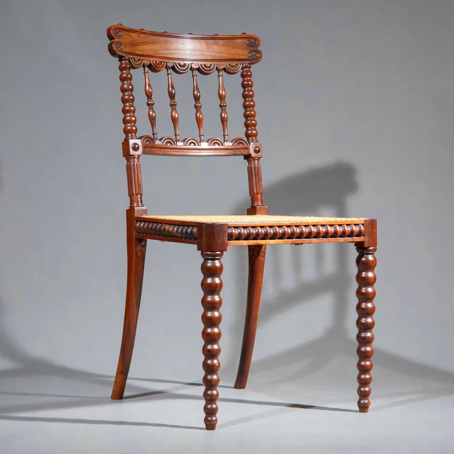 Pair of Regency Gonçalo Alves Chairs with Caned Seats