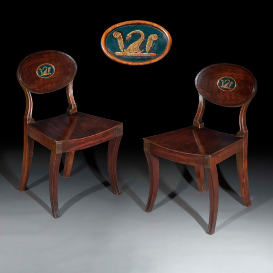 Early 19th Century Pair of Regency Klismos Hall Chairs with Armorial Backs