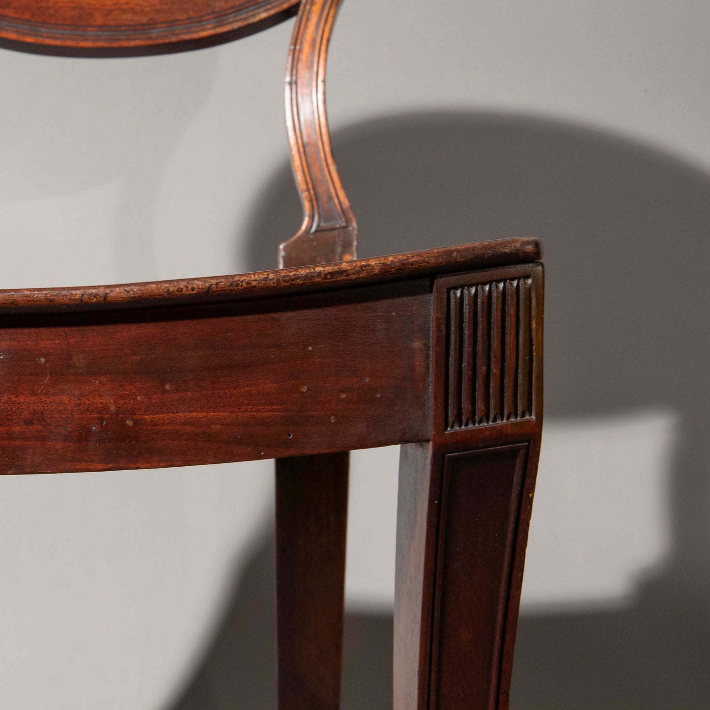 Early 19th Century Pair of Regency Klismos Hall Chairs with Armorial Backs