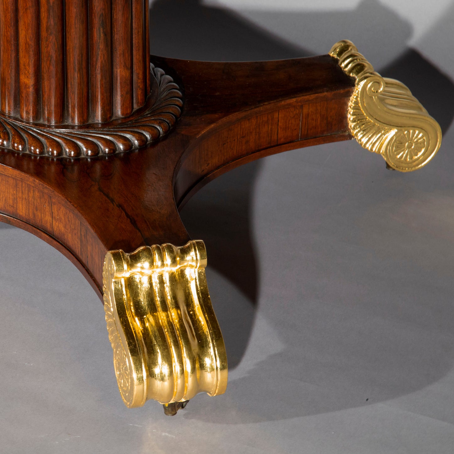 Regency Parcel Gilt and Brass Inlaid Dining Table