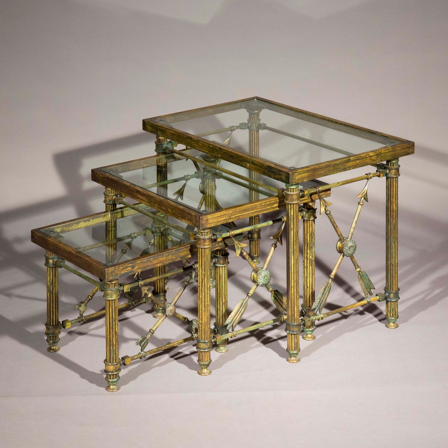 A Set of 'Pompeian' Bronze Cocktail Tables