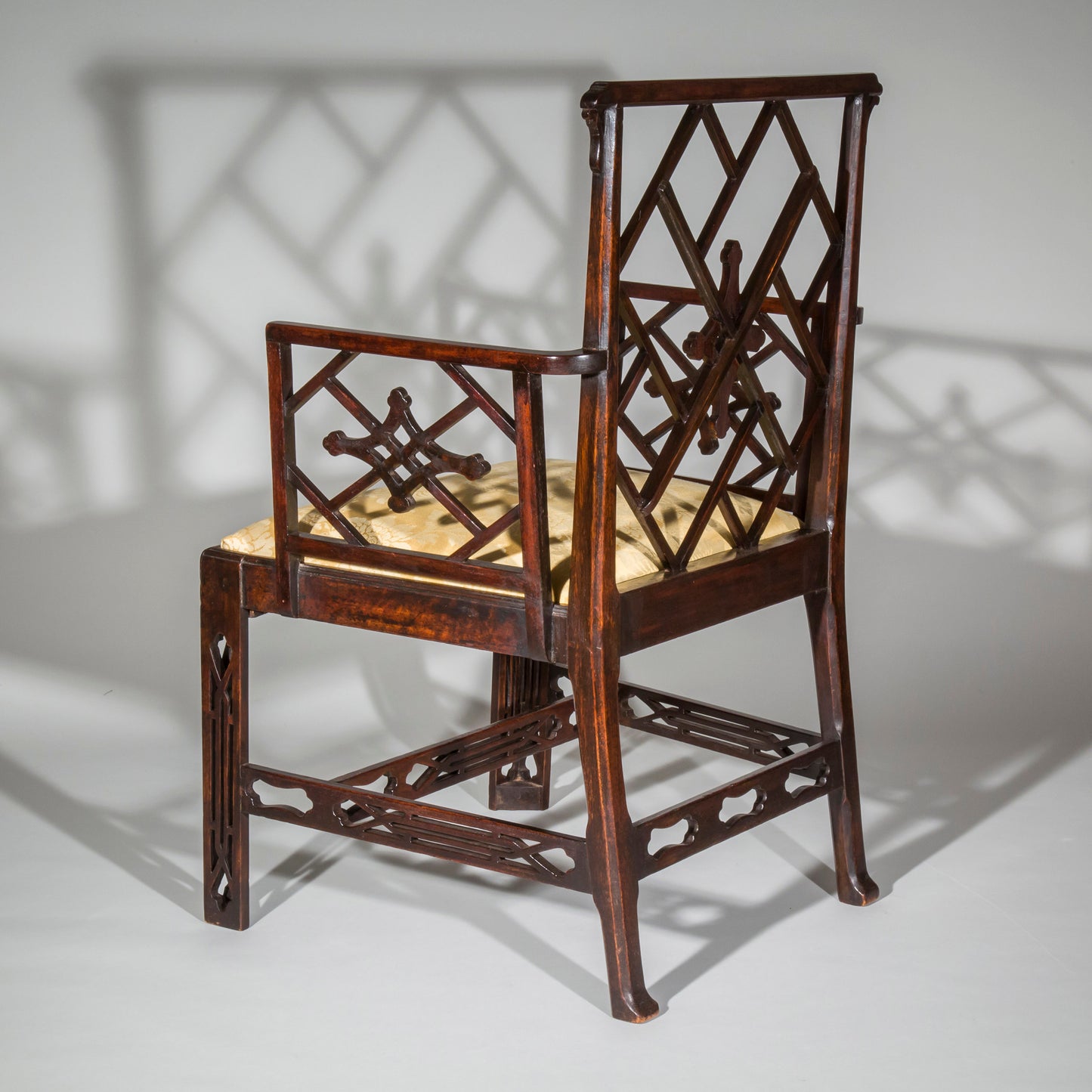 Pair of George III Chinoiserie Armchairs, to a design by Mayhew & Ince