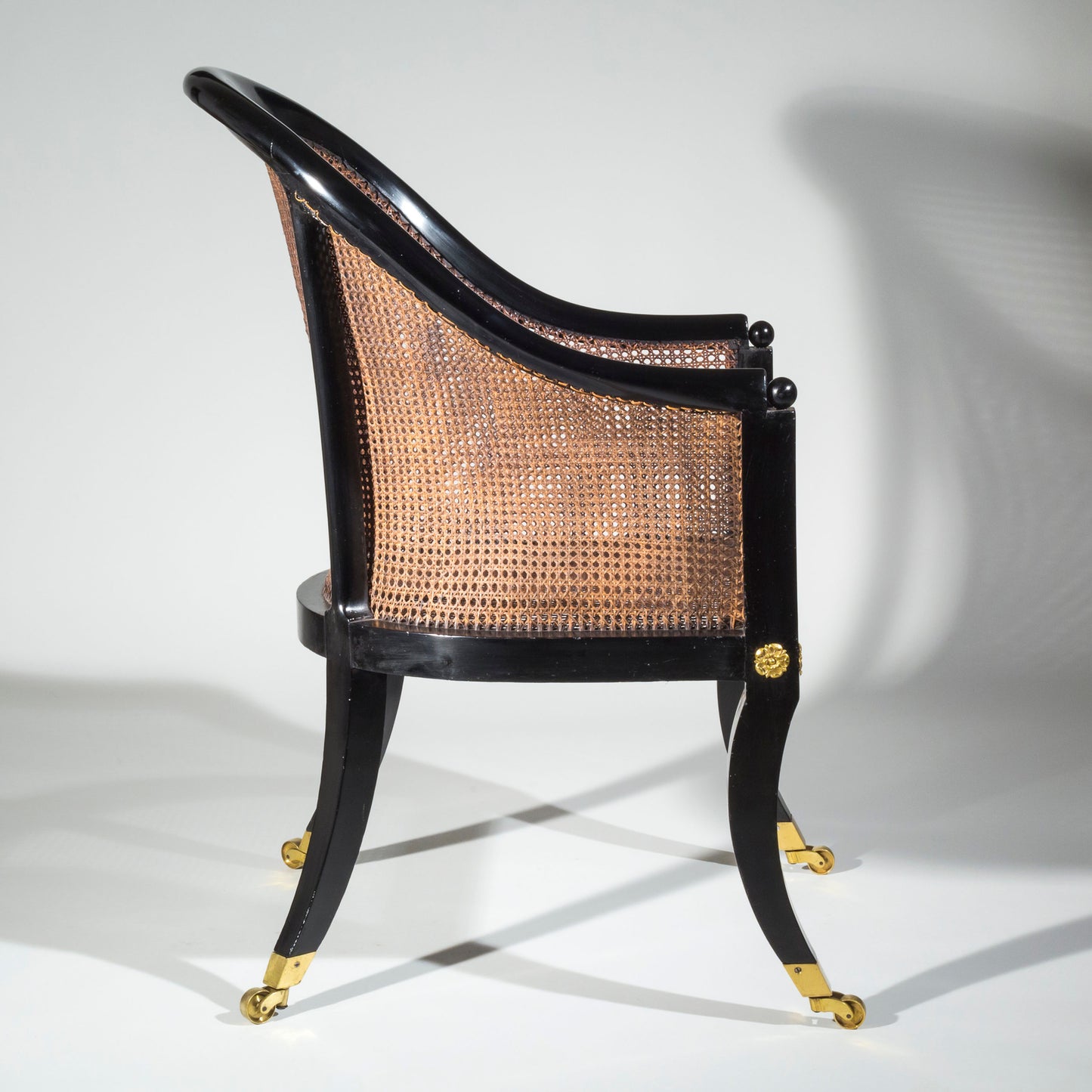 Regency Ebonised Klismos Bergere Armchair, attributed to Gillows