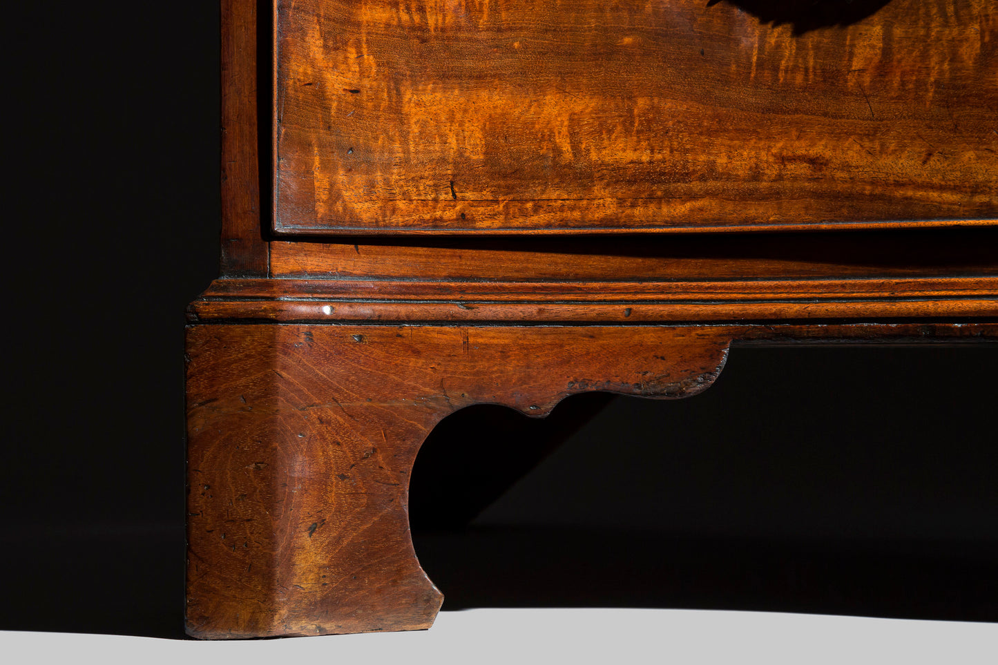 George III Serpentine Chest of Drawers, attributed to Thomas Chippendale