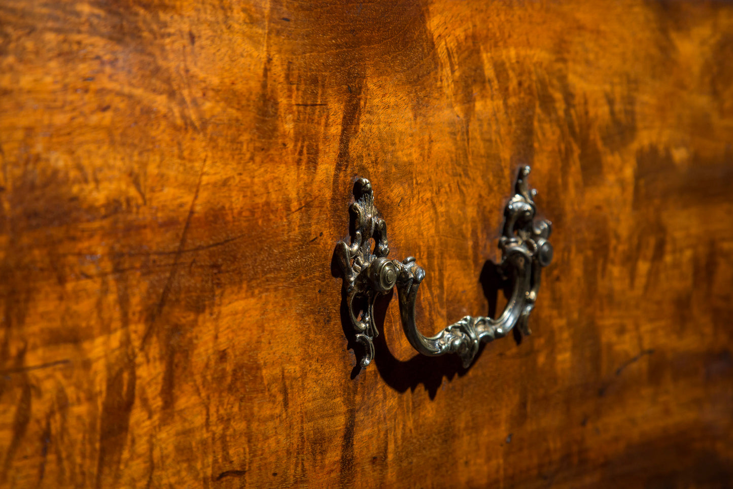 George III Serpentine Chest of Drawers, attributed to Thomas Chippendale