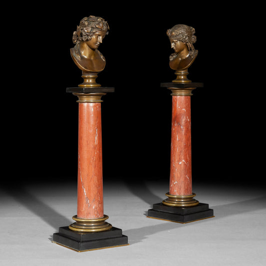 Antinous and Dionysus, a Pair of Bronze Busts on Marble Columns