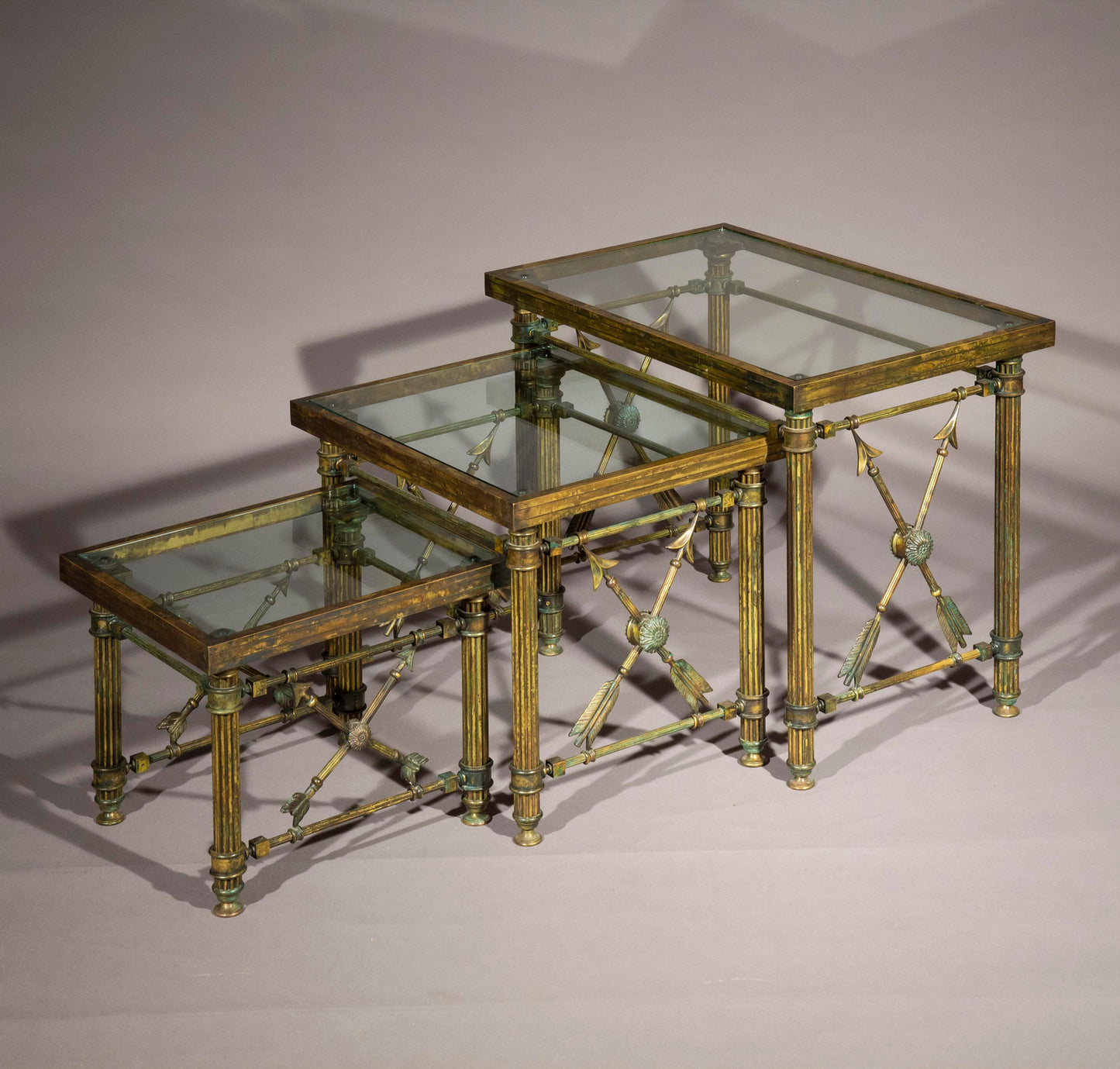 A Set of 'Pompeian' Bronze Cocktail Tables