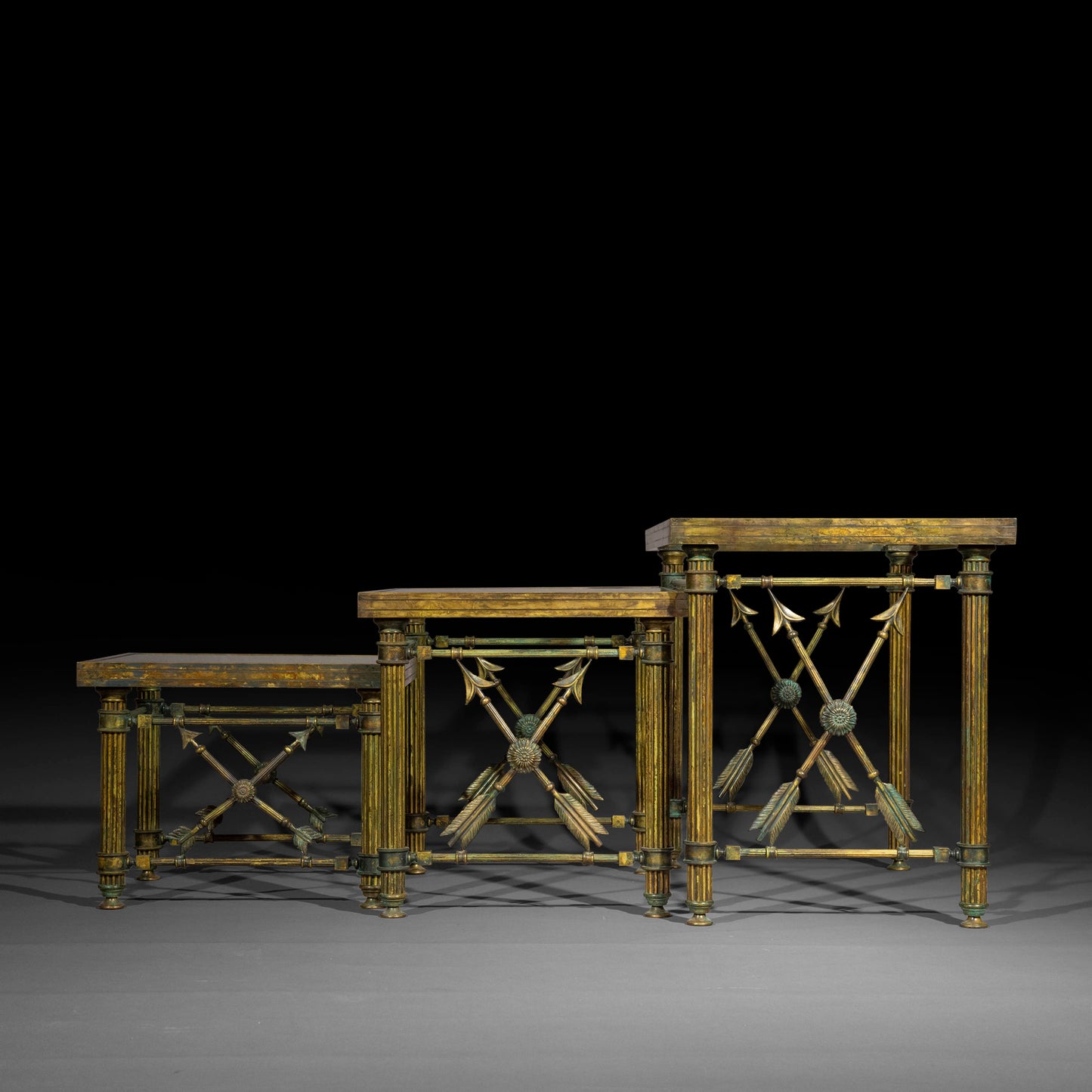 A Set of 'Pompeian' Bronze Cocktail Tables