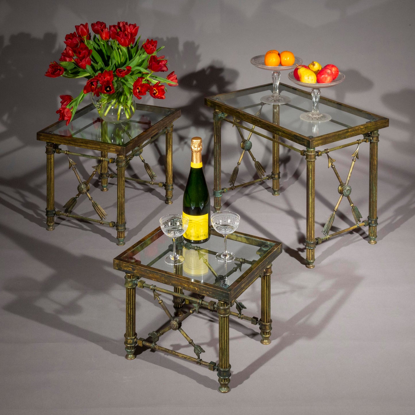 A Set of 'Pompeian' Bronze Cocktail Tables