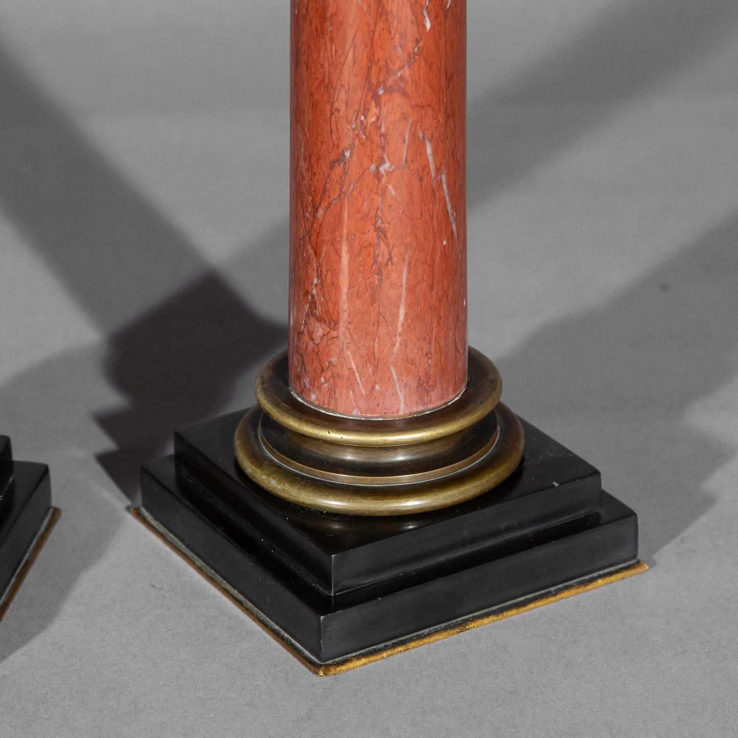 Antinous and Dionysus, a Pair of Bronze Busts on Marble Columns