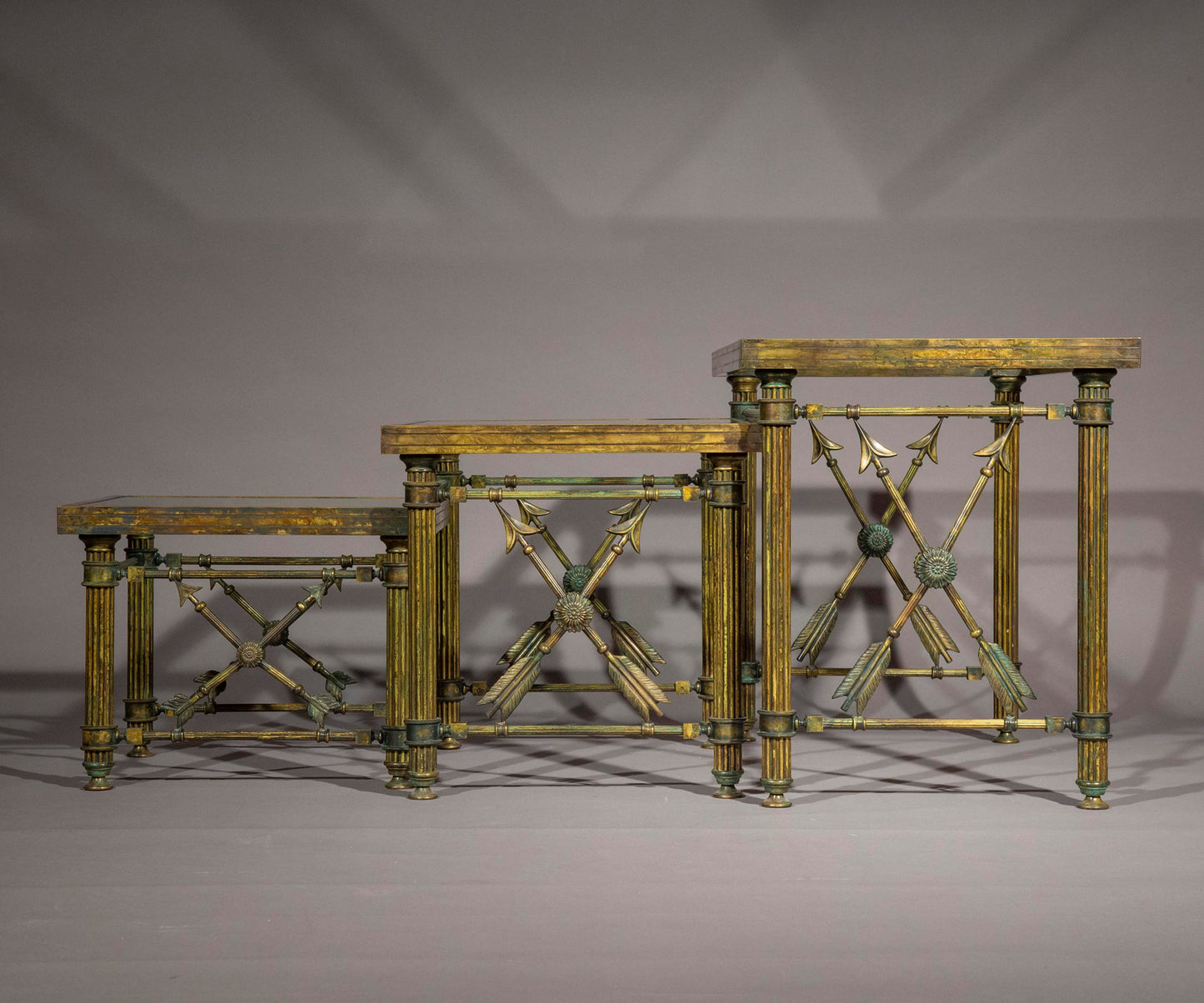 A Set of 'Pompeian' Bronze Cocktail Tables