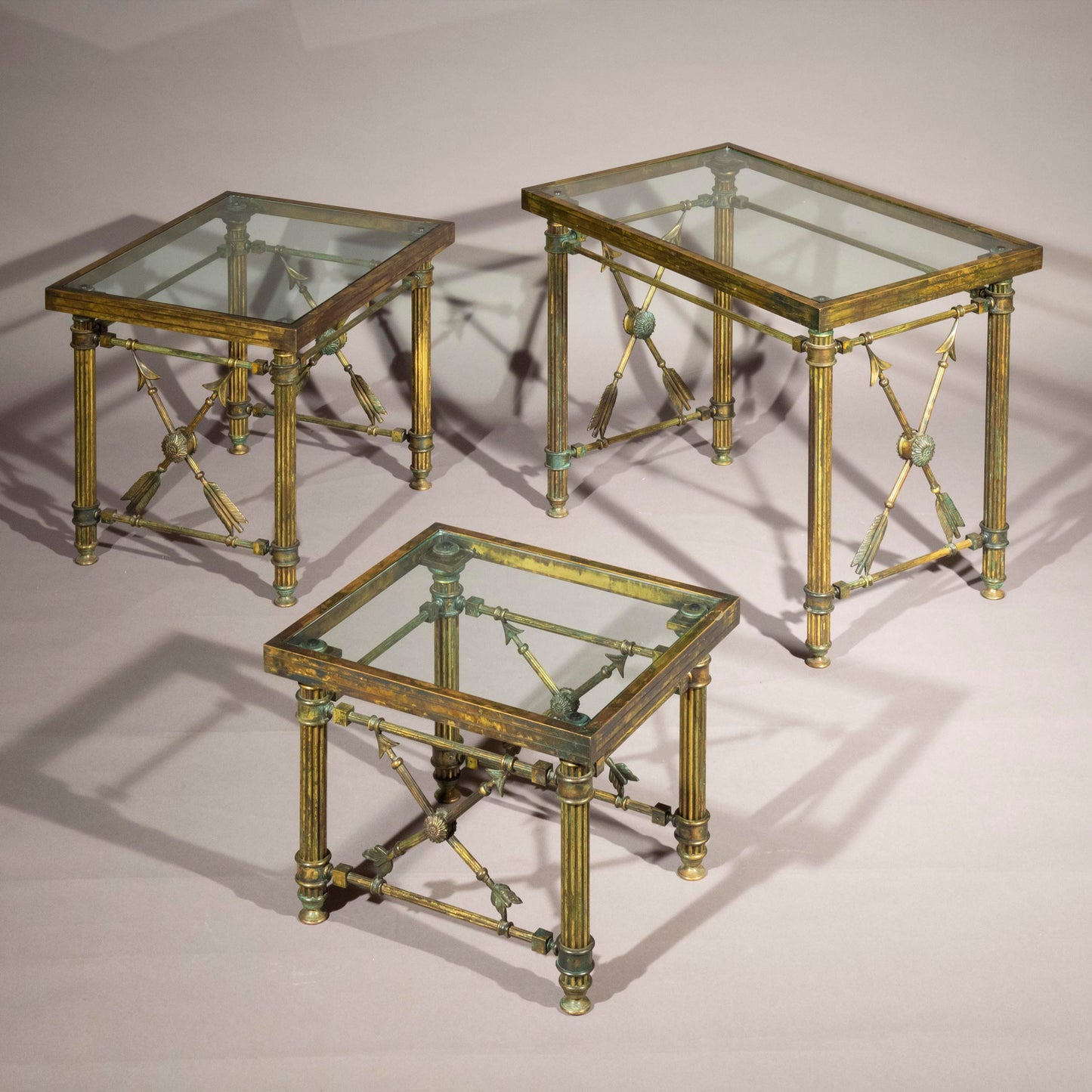 A Set of 'Pompeian' Bronze Cocktail Tables