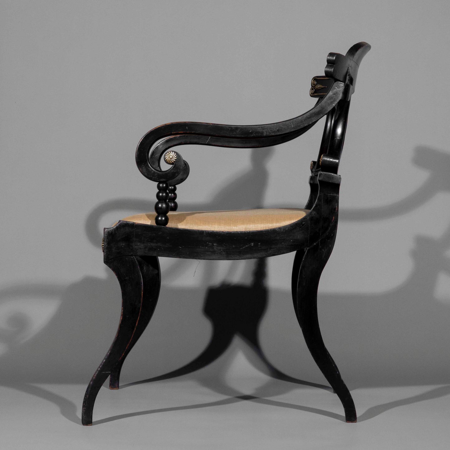 Early 19th Century Pair of Black Painted Klismos Armchairs