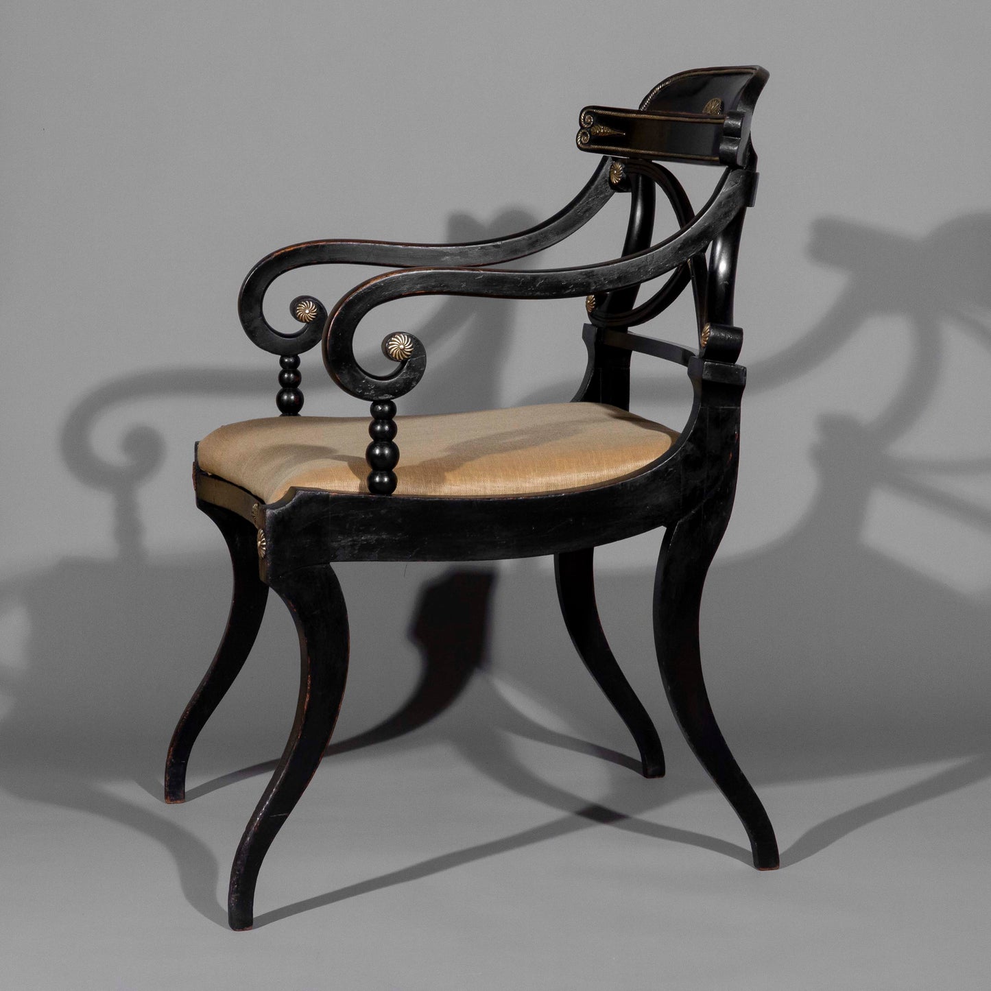 Early 19th Century Pair of Black Painted Klismos Armchairs