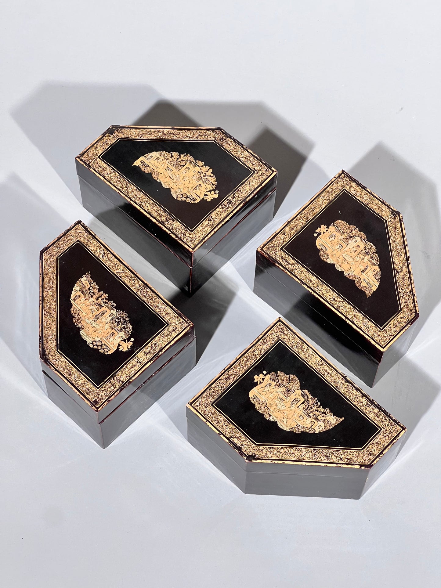 Set of Four Early 19th Century Chinoiserie Black Lacquer Boxes