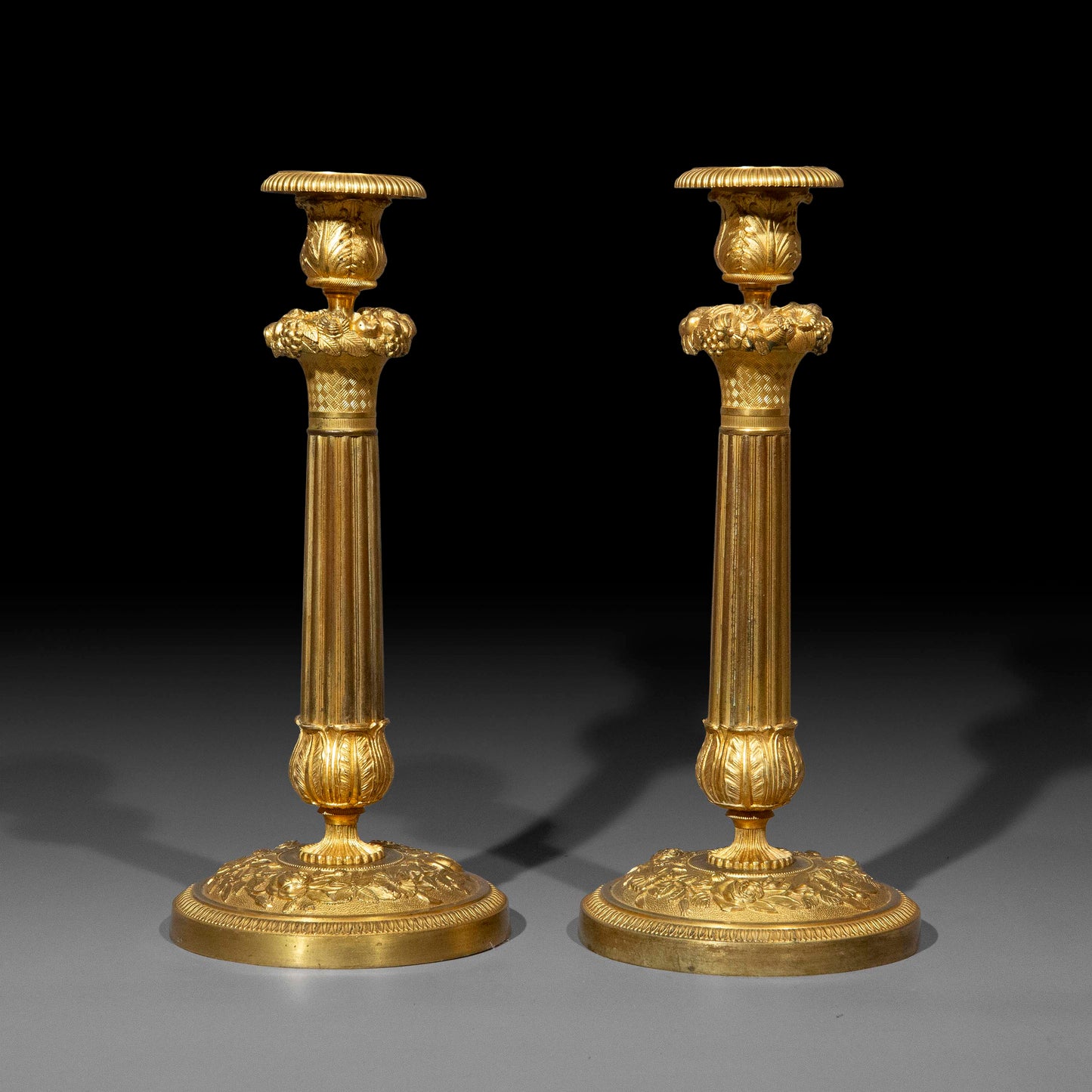 Pair of Early 19th Century French Neoclassical Ormolu Candlesticks