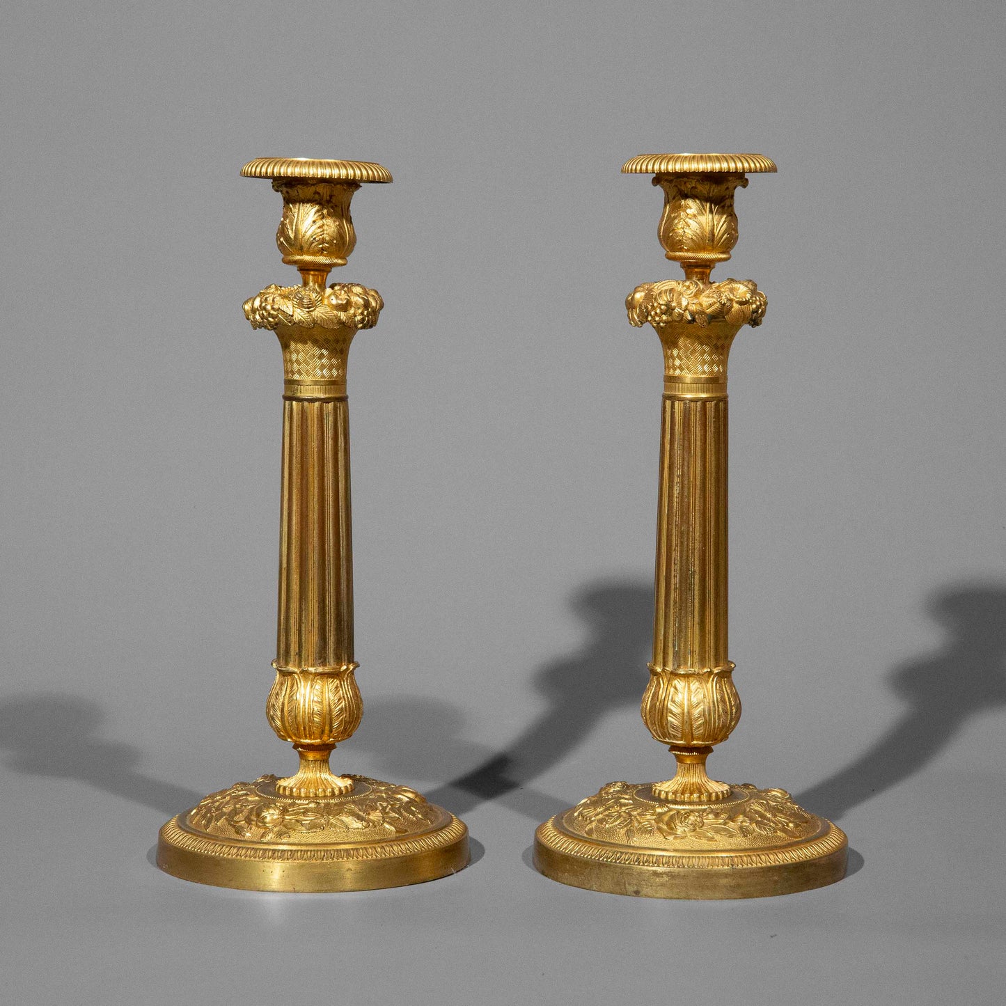 Pair of Early 19th Century French Neoclassical Ormolu Candlesticks