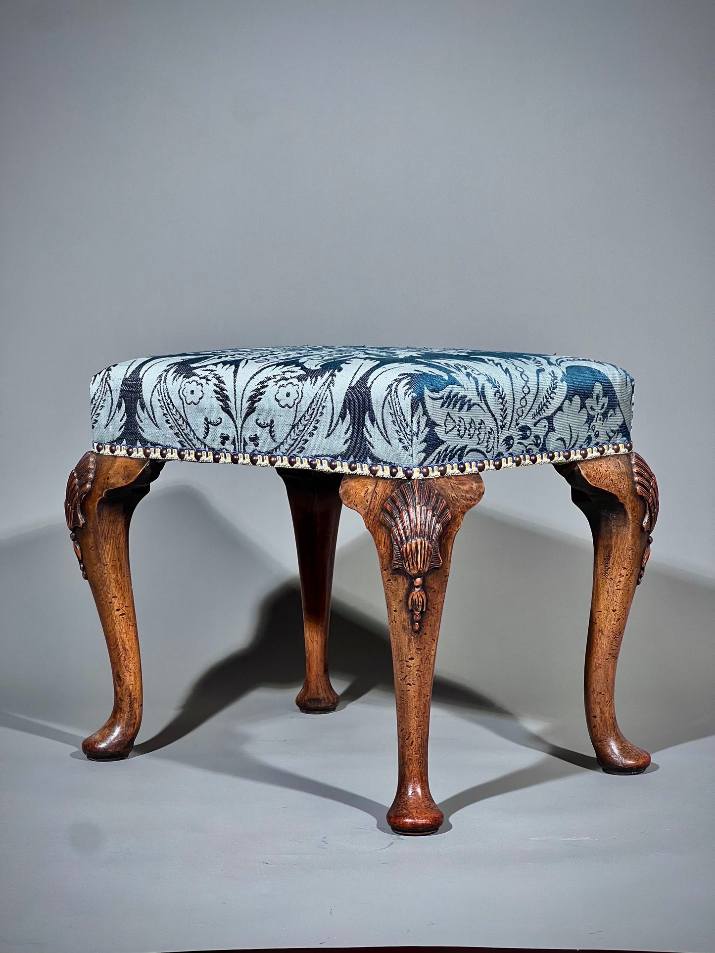 Early 20th Century Queen Anne Style Walnut Stool in Blue Damask