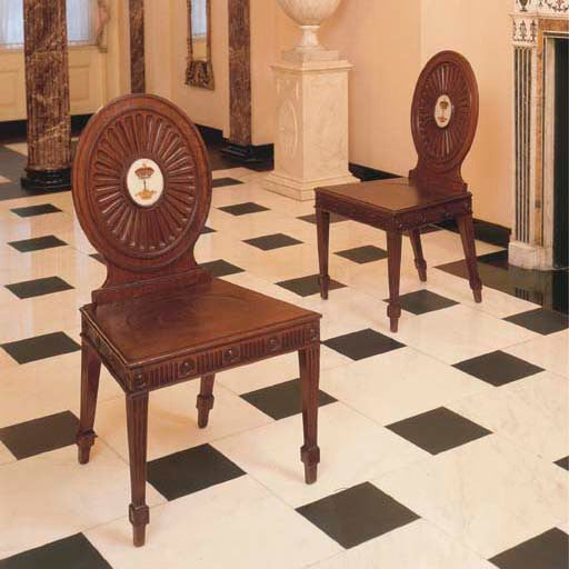 Pair of George III Hall Chairs, attributed to Mayhew and Ince