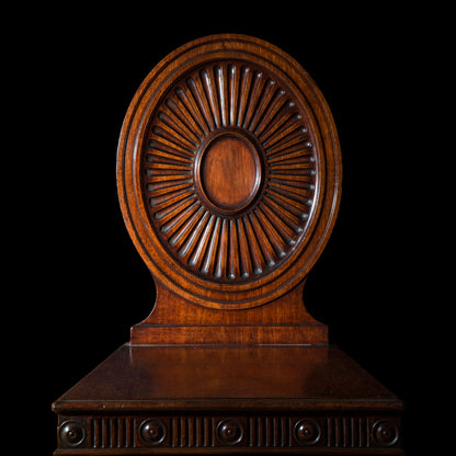 Pair of George III Hall Chairs, attributed to Mayhew and Ince